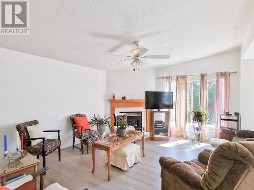 5307 Canim-Hendrix Lake Road, 100 Mile House, BC - Indoor Photo Showing Living Room With Fireplace