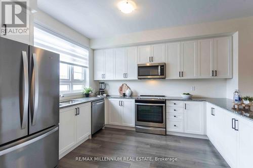 #302 -250 Finch Ave, Pickering, ON - Indoor Photo Showing Kitchen With Stainless Steel Kitchen