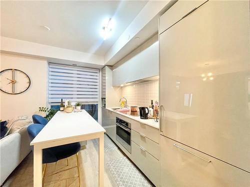 65 Annie Craig Drive|Unit #1006, Toronto, ON - Indoor Photo Showing Kitchen With Upgraded Kitchen