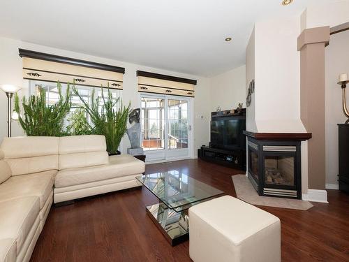 Living room - 785 Ch. Du Coteau, Terrebonne (Lachenaie), QC - Indoor Photo Showing Living Room With Fireplace