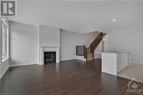 709 Maverick Crescent, Ottawa, ON - Indoor Photo Showing Living Room With Fireplace