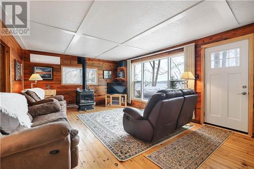 201 Great Heron Lane, Killaloe, ON - Indoor Photo Showing Living Room With Fireplace