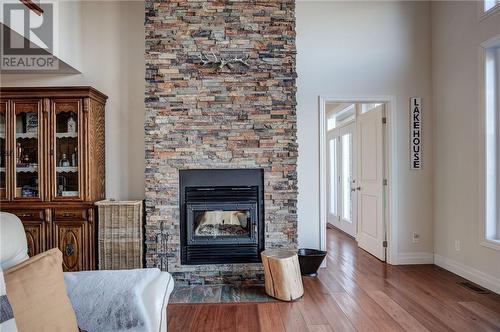 150B Beach Left Road, Massey, ON - Indoor Photo Showing Living Room With Fireplace