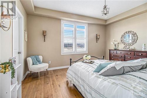 Primary bedroom with California shutters & no rear neighbours. - 298 Pembina Private, Ottawa, ON - Indoor Photo Showing Bedroom