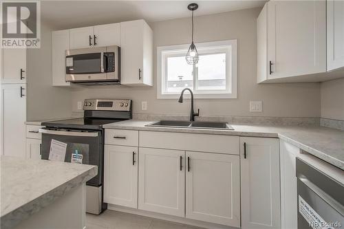 42 Willowood Drive, Willow Grove, NB - Indoor Photo Showing Kitchen With Double Sink