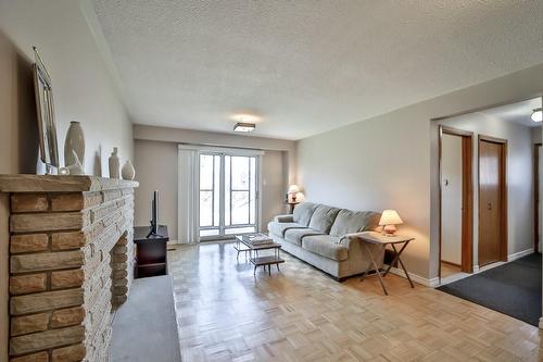 296 Ridge Drive, Milton, ON - Indoor Photo Showing Living Room With Fireplace