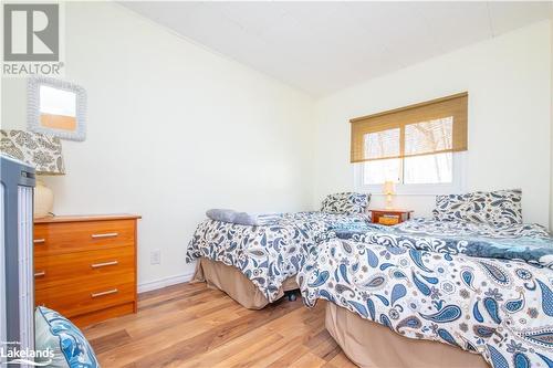 Second bedroom - 562 & 568 E Waseosa Lake Road, Huntsville, ON - Indoor Photo Showing Bedroom