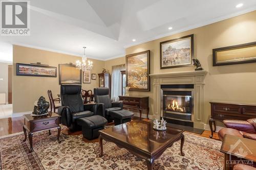 137 Beaumont Avenue, Rockland, ON - Indoor Photo Showing Living Room With Fireplace