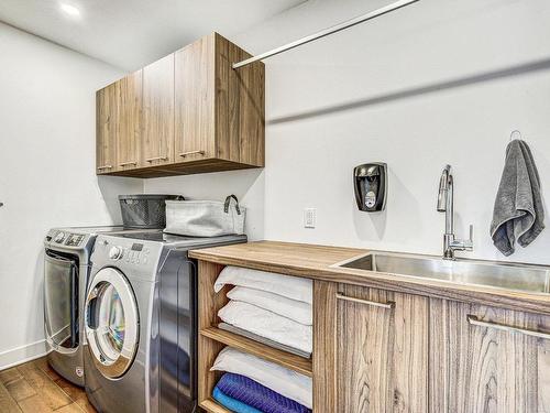 Salle de lavage - 4  - 6 Rue D'Andromède, Saint-Hippolyte, QC - Indoor Photo Showing Laundry Room
