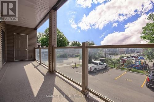 #101 -128 Barrie St, Bradford West Gwillimbury, ON - Outdoor With Balcony With View