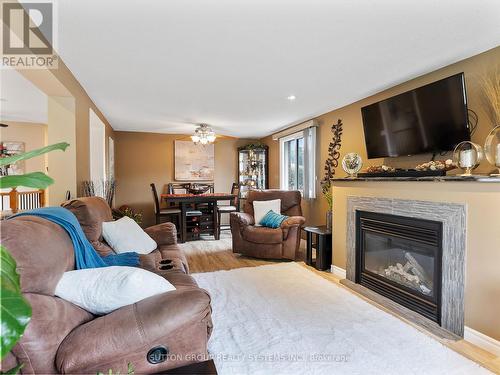 20 Miller Crescent, Norfolk, ON - Indoor Photo Showing Living Room With Fireplace