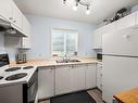112-1050 Braidwood Rd, Courtenay, BC  - Indoor Photo Showing Kitchen With Double Sink 