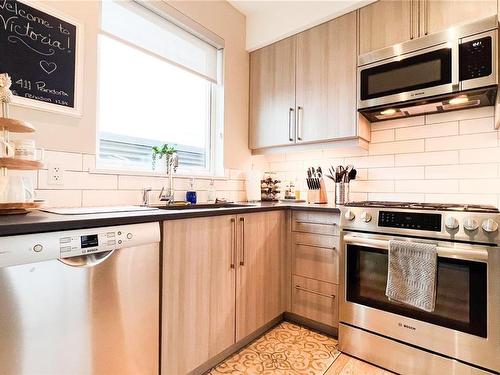 411-595 Pandora Ave, Victoria, BC - Indoor Photo Showing Kitchen With Upgraded Kitchen
