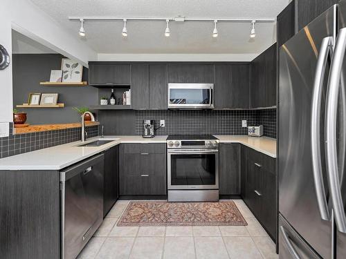 310-2059 Kaltasin Rd, Sooke, BC - Indoor Photo Showing Kitchen With Upgraded Kitchen
