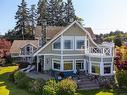 5525 Island Hwy West, Qualicum Beach, BC  - Outdoor With Deck Patio Veranda With Facade 