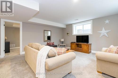 1402 Flos Road 8  E, Springwater, ON - Indoor Photo Showing Living Room