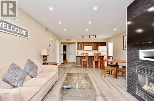 #2014/15 -90 Highland Dr, Oro-Medonte, ON - Indoor Photo Showing Living Room With Fireplace