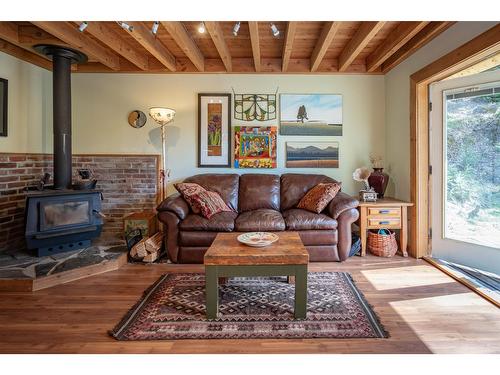 8788 Highway 6, Silverton, BC - Indoor Photo Showing Living Room With Fireplace