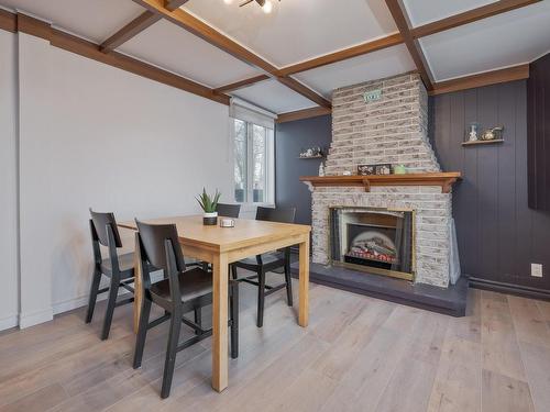 Dining room - 17  - 19 Ch. Du Fleuve, Pointe-Des-Cascades, QC - Indoor With Fireplace