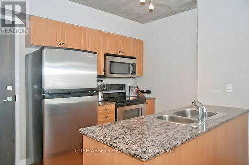 #807 -22 Wellesley St E, Toronto, ON - Indoor Photo Showing Kitchen With Double Sink