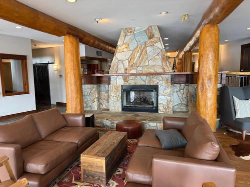1 - 5258 Highline Drive, Fernie, BC - Indoor Photo Showing Living Room With Fireplace