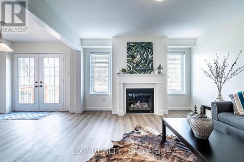 8741 Dogwood Crescent, Niagara Falls, ON - Indoor Photo Showing Living Room With Fireplace