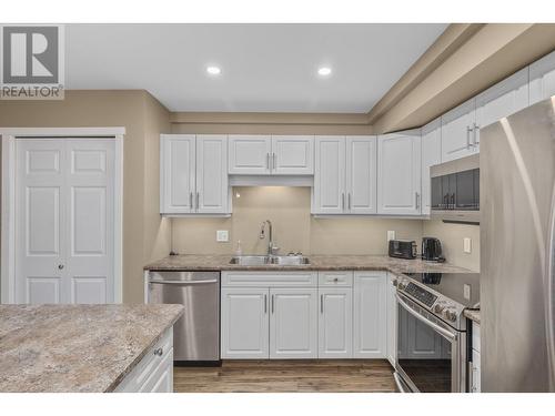 250 Dougall Road N Unit# 304, Kelowna, BC - Indoor Photo Showing Kitchen With Stainless Steel Kitchen With Double Sink