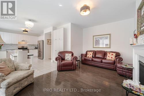 4 Bandera Dr, Brampton, ON - Indoor Photo Showing Living Room With Fireplace