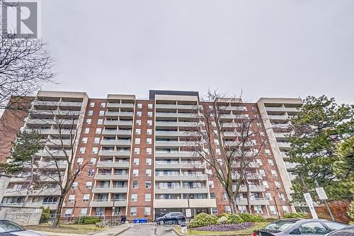 1113 - 9 Four Winds Drive, Toronto, ON - Outdoor With Balcony With Facade