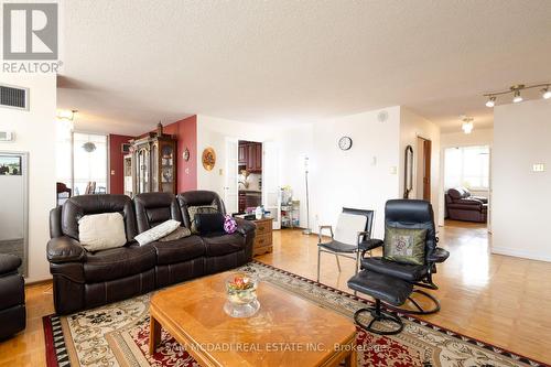 1707 - 3650 Kaneff Crescent, Mississauga, ON - Indoor Photo Showing Living Room