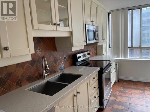 1107 - 633 Bay Street, Toronto, ON - Indoor Photo Showing Kitchen With Double Sink