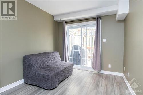 Main level rec room with walk-out to your backyard. - 285 Lebreton Street S, Ottawa, ON - Indoor Photo Showing Other Room