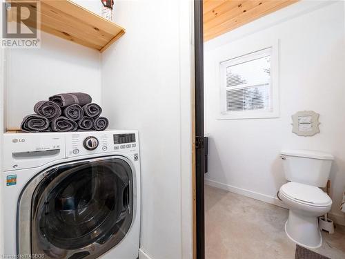 Combo washer / dryer unit. - 251 Cape Chin North Shore Road, Northern Bruce Peninsula, ON - Indoor Photo Showing Laundry Room