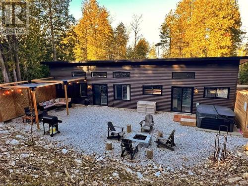 Low maintenance exterior! - 251 Cape Chin North Shore Road, Northern Bruce Peninsula, ON - Outdoor With Fireplace