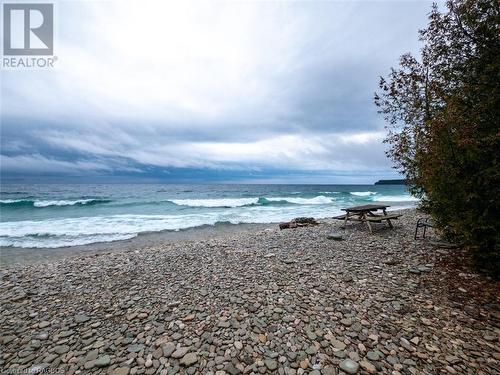 Enjoy access to a clean rocky shoreline & Georgian Bay sunrises! - Water access nearby - 251 Cape Chin North Shore Road, Northern Bruce Peninsula, ON - Outdoor With Body Of Water With View