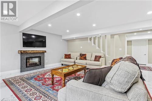 1507 Berkshire Drive, Kingston, ON - Indoor Photo Showing Living Room With Fireplace