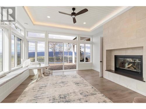7500 Mclennan Road, Vernon, BC - Indoor Photo Showing Living Room With Fireplace