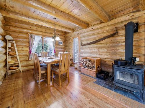 2604 Big Bend Highway, Golden, BC - Indoor Photo Showing Dining Room With Fireplace
