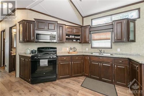 #H23 - 240 Pinewood Park Road, Haley Station, ON - Indoor Photo Showing Kitchen With Double Sink