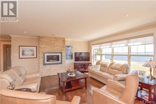 634 Pointe Des Ferguson Road, Tracadie, NB - Indoor Photo Showing Living Room With Fireplace
