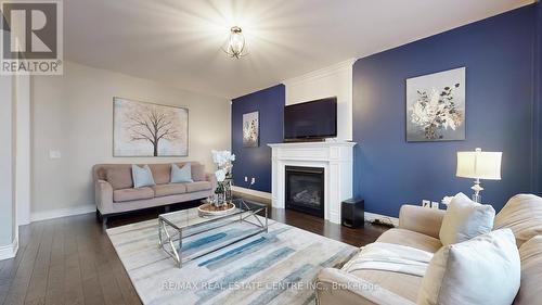 9 Pellegrino Road, Brampton, ON - Indoor Photo Showing Living Room With Fireplace