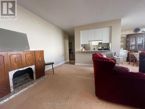 #1806 -1455 Lawrence Ave W, Toronto, ON - Indoor Photo Showing Living Room With Fireplace