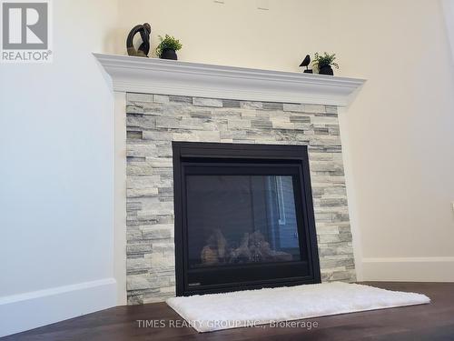 164 Wilmer Ave, Gananoque, ON - Indoor Photo Showing Living Room With Fireplace