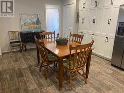 Dining Area with wall of closets - 