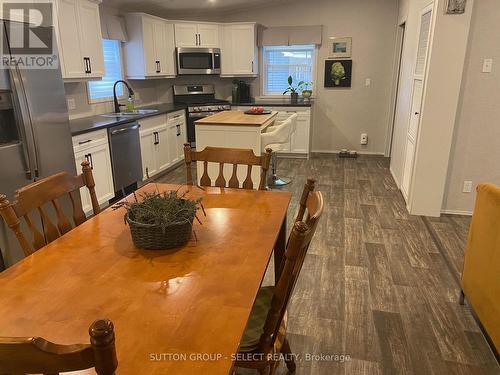 View of Kitchen from Dining Table - 55 - 22790 Amiens Road, Middlesex Centre (Komoka), ON - Indoor