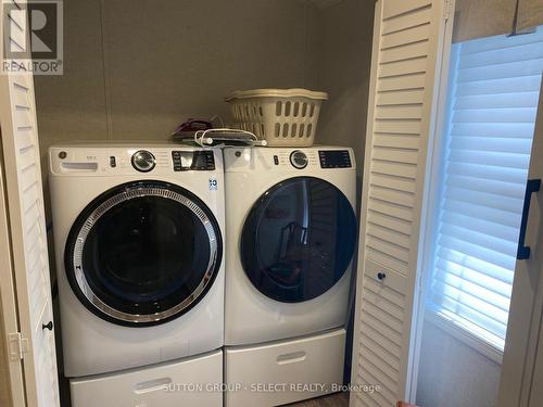 Full Size Washer & Dryer - 55 - 22790 Amiens Road, Middlesex Centre (Komoka), ON - Indoor Photo Showing Laundry Room