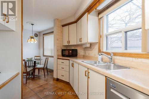 1516 Lawrence Ave W, Toronto, ON - Indoor Photo Showing Kitchen With Double Sink