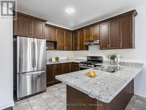 49 Rangemore Rd, Brampton, ON - Indoor Photo Showing Kitchen With Double Sink