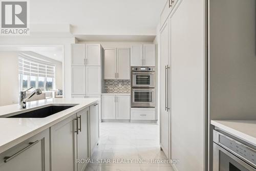 9 Sanford Circle, Springwater, ON - Indoor Photo Showing Kitchen With Upgraded Kitchen