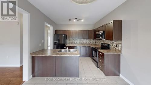 15 Orleans Avenue, Barrie, ON - Indoor Photo Showing Kitchen With Double Sink With Upgraded Kitchen